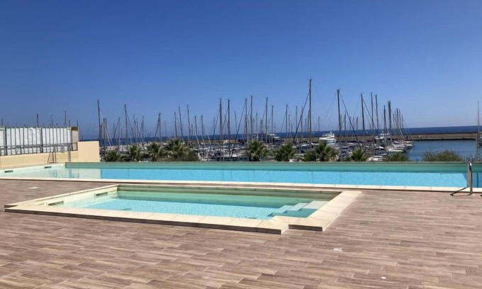 Santo Stefano al Mare Apartment | Discover Marta by Interhome: Oceanfront Retreat with Spa