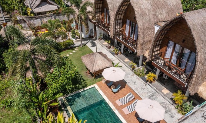 Kuta Hotel | Relax at Martas Windows: Poolside Ocean Views & Breakfast