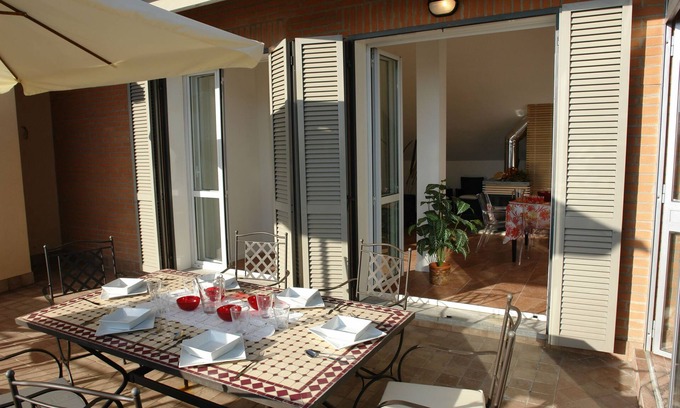 Intra Apartment | Discover Martini Symphony: Pet-Friendly Stay with Spa Access