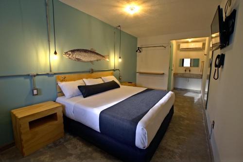 Veracruz Hotel | Pet-Friendly Mas Basico Hotel with Oceanfront Pool & Dining