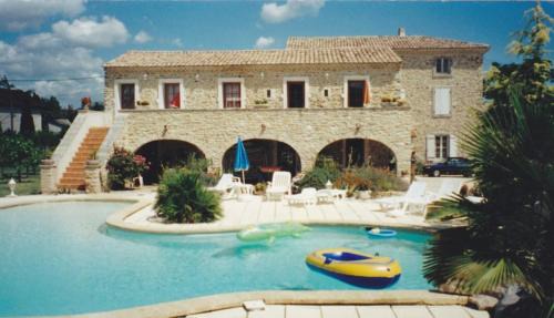 Saint-Julien-de-Peyrolas Apartment | Discover Mas du Garidel: Private Pool Apartments Near Ardèche