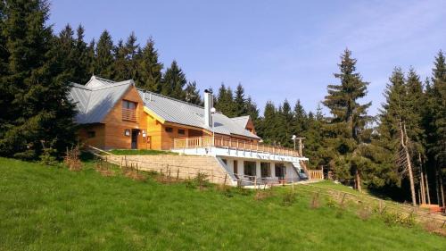Bila Cabin | Discover Masarykova Chata: Oceanfront Retreat with Spa