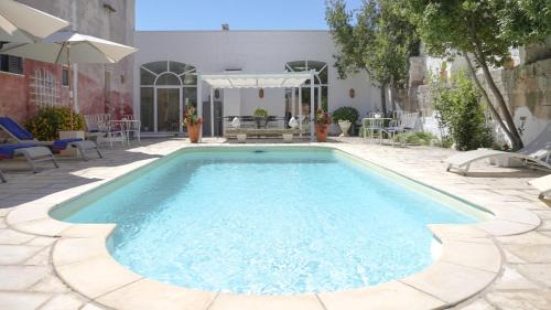 Spongano House | Experience Masseria La Macchiola & Corti del Mito's Poolside Bliss