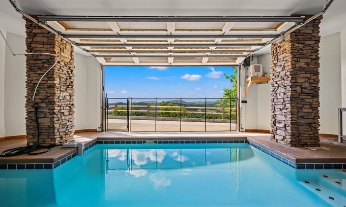 Gatlinburg - Pigeon Forge Cabin | Stunning Views with Pool, Theater & Fire Pit Experience