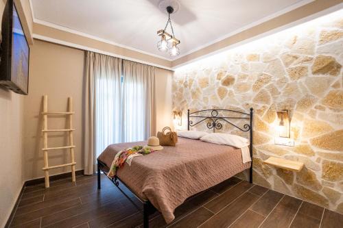Gouvia Apartment | Mathraki Resort: Family-Friendly Stay with Oceanfront Views