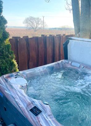 Villany Apartment | Discover Maul: Oceanfront Haven with Hot Tub & Pet Friendly