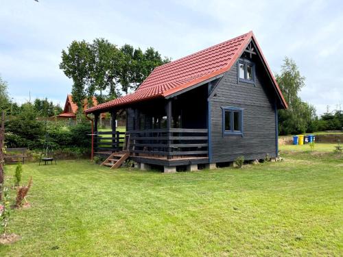 Rydzewo Apartment | Idyllic Mazurska Zagroda Domek Letniskowy with Ocean View