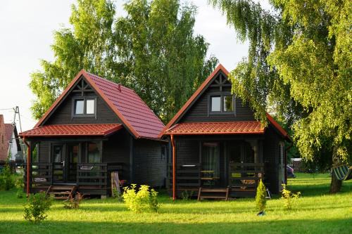 Rydzewo Apartment | Discover Mazurska Zagroda with Private Beach & Ocean Views