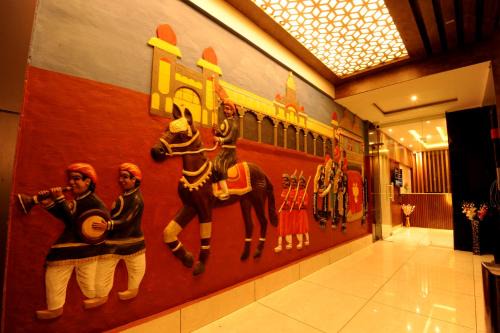 Mysore Hotel | Family-Friendly MC Suites Mysuru with Restaurant & Kitchen