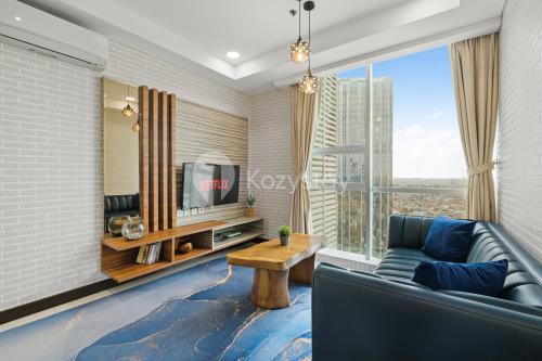 Kebon Jeruk Apartment | Explore Meadow by Kozystay: Family-Friendly with Pool
