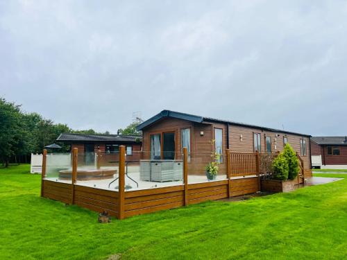 Malton Cabin | Inviting Meadows Lodge with Hot Tub and Family-Friendly Amenities