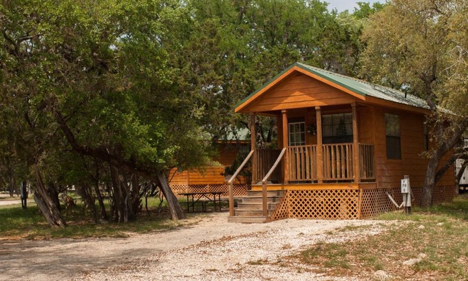 Lakehills Resort | Pet-Friendly Medina Lake Camping Resort Cabin 3 with Pool