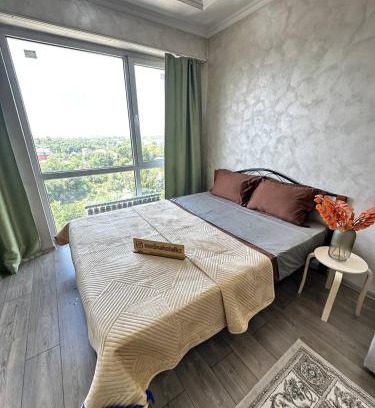 Almaty Apartment | Scenic MedinahotelKZ: Mountain Views & Family-Friendly Stay