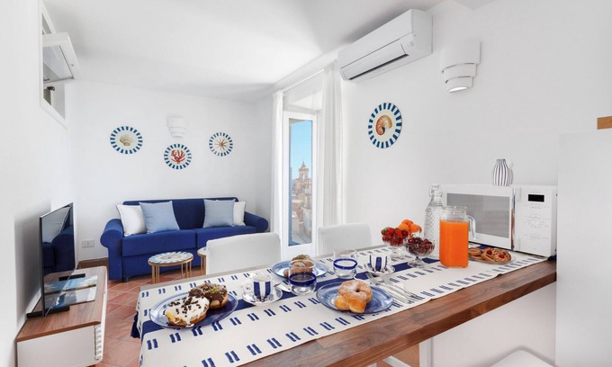 Liparlati Apartment | Inviting Medusa Positano: Spa, Breakfast & Family-Friendly