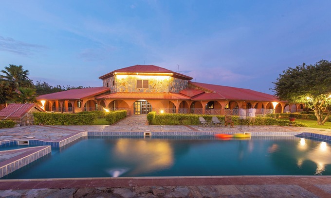 North Tongu Resort | Relax at Mekandi Riverside Resort: Pool, Spa & Family Fun