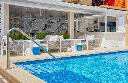 St. Lawrence Gap House | Discover Melbourne Inn: Oceanfront Escape with Pool Access