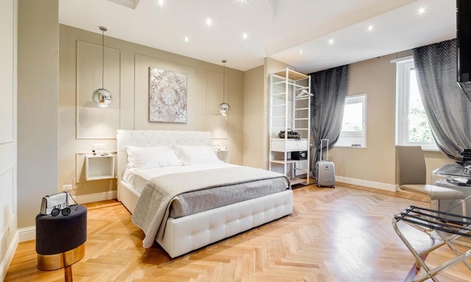 Prati House | Elegant Mellini Palace Suites with Hot Tub & Family Appeal