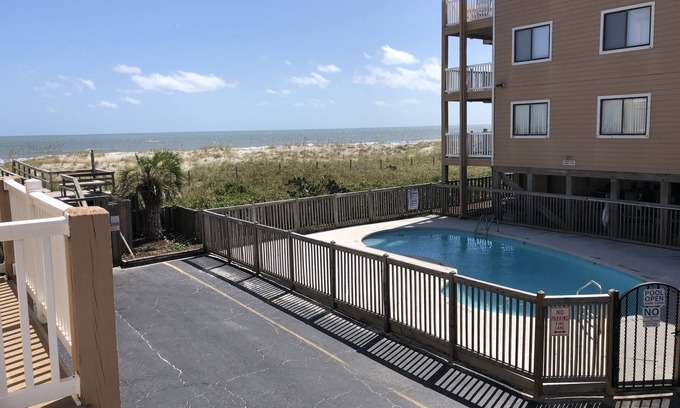 Wilmington Beach Condo | Unforgettable Oceanfront Escape with Pool and WiFi Access