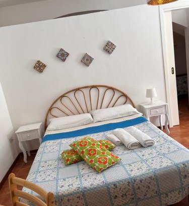 Vulcano Porto Apartment | Rosetta Bilo: Relax by the Pool in Family-Friendly Retreat