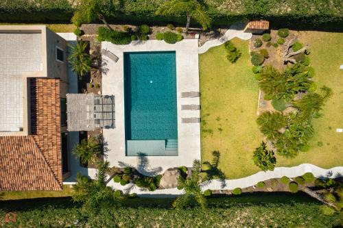 Partinico Villa | Beautiful Villa in Trappeto with Oceanfront Pool Access