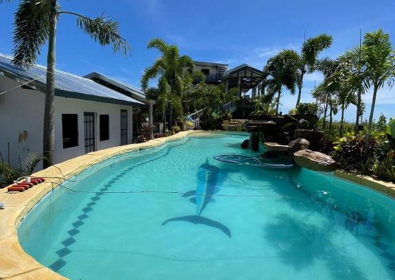 Liloan House | Pet-Friendly Retreats at Merceleona's Rentals with Pool Access