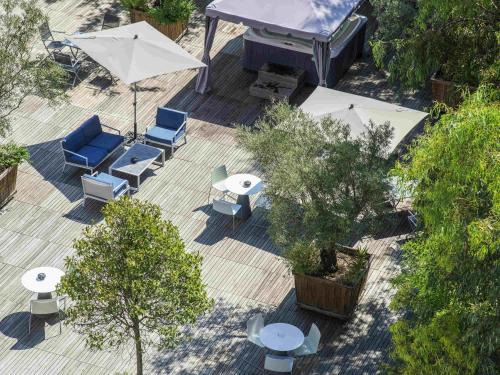 Ajaccio Hotel | Relax at Mercure Ajaccio: Poolside Oceanfront Retreat