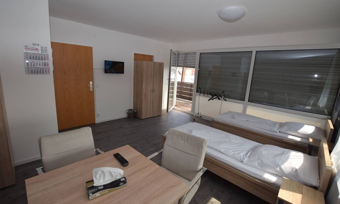 Wolfschlugen House | Discover Messezimmer AB Apartments: Child-Friendly Comfort