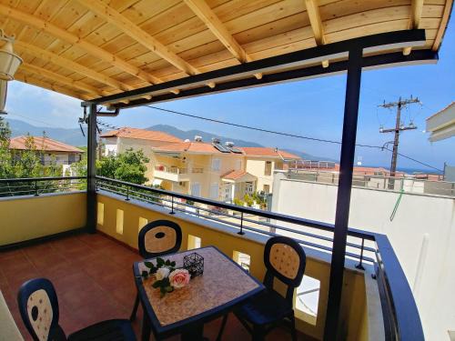 Chrisi Akti Apartment | Elegant Methexis Apartment with Oceanfront Views & Hot Tub