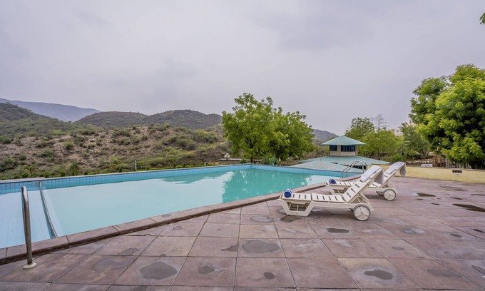 Udaipur District Resort | Discover Mewar Palace Resort: Pool, Restaurant & More