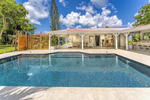 Grand-Bourg Villa | Discover mggb05: Family-Friendly 4-Star Retreat with Pool