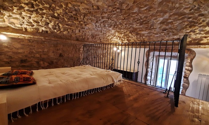 Tolfa Apartment | Discover MGResidenceTolfa: Family-Friendly with Spa & Kitchen