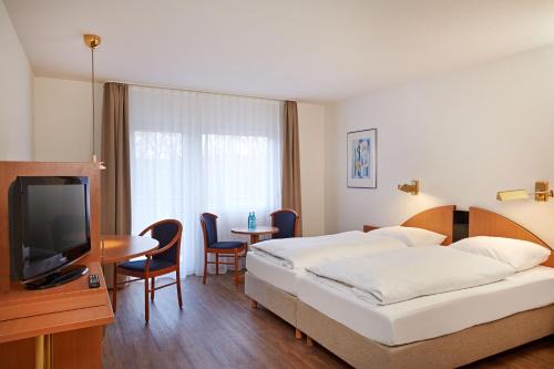 Niedernhausen Apartment | Pet-Friendly Micador Appartementhaus with Hot Tub & Dining