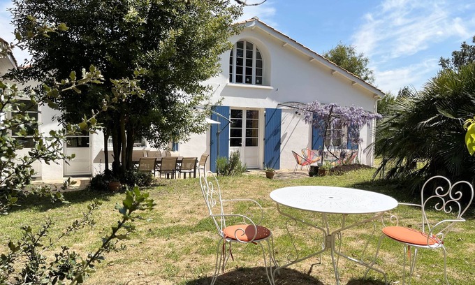 Le Grand-Village-Plage House | Beachfront Retreat Surrounded by Lush Forest and Amenities