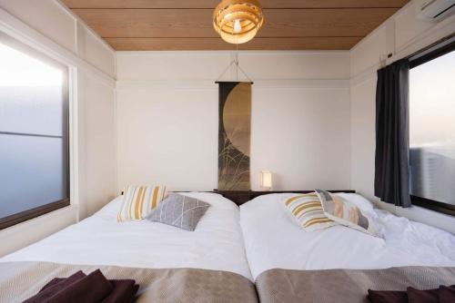 Kita Apartment | Family-Friendly Retreat at Mikazuki Ukima / MU1 Awaits