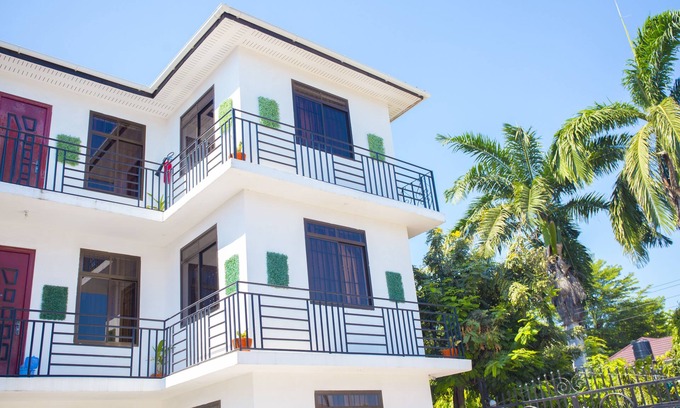 Mikocheni Hotel | Family-Friendly Mikocheni Condo Hotel with Pool & Dining