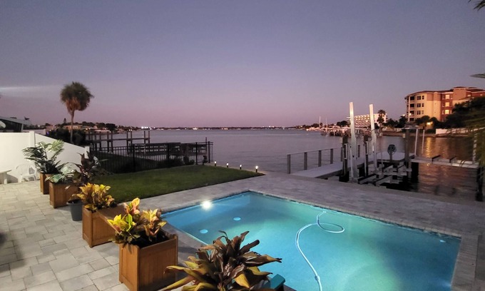 Treasure Island Villa | Discover Your Paradise: Waterfront Duplex with Pool & Dock