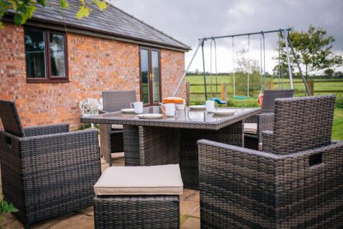 Malpas Cabin | Relaxing Millmoor Farm Holidays: Pet-Friendly Getaway