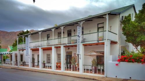 Montagu Hotel | Discover Mimosa Lodge: 4-Star Family Haven with Pool