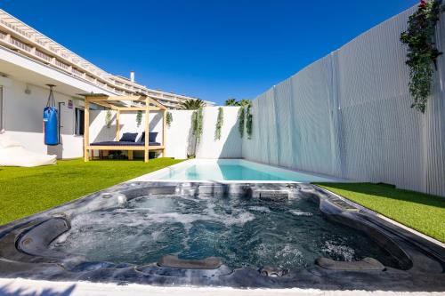 San Agustin House | Relax at Mimosas Suites: Pool, Spa & Family-Friendly Fun
