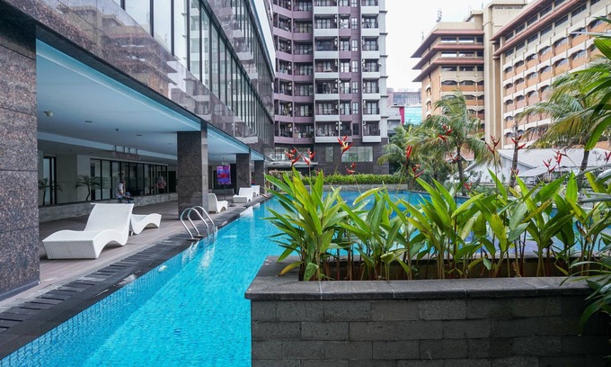 Senayan Apartment | Strategic 1BR Retreat with Pool at Tamansari Semanggi
