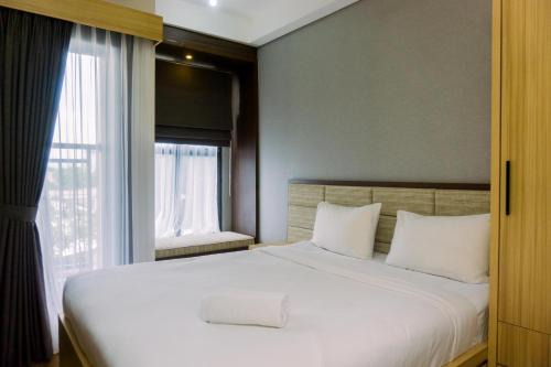 Ciputat Apartment | Minimalist and Warm Studio at Transpark Bintaro Apartment By Travelio