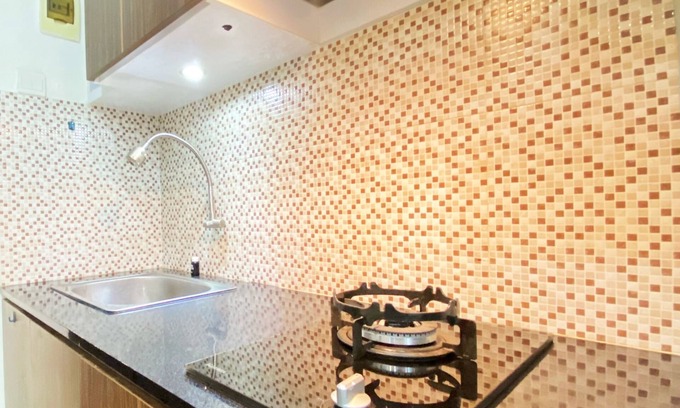 Malabar Apartment | Modern 2-Bedroom Retreat at Grand Asia Afrika Apartment