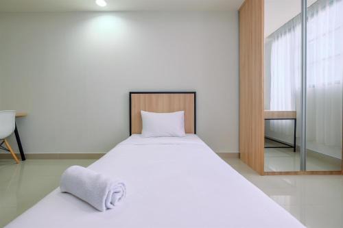 Pondokcina Apartment | Modern Studio Room at Evenciio Margonda with Pool Access