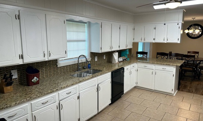 Benton House | Prime Location Near Cypress Lake & Top Local Venues
