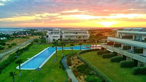 El Rompido Apartment | Inviting Mirador Altos del Rompido: Poolside Family Escape