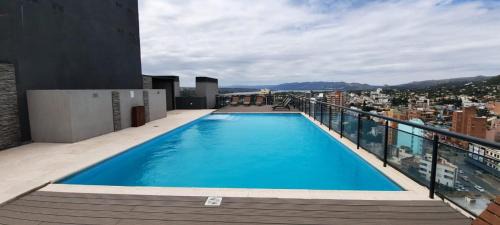 Villa Carlos Paz Apartment | Perfect Miralejos 7 Music: Family-Friendly with Pool Access