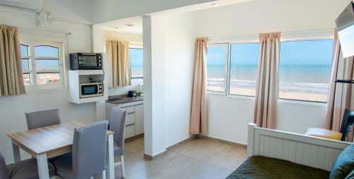 Ostende Apartment | Relax at Mitos del Mar: Ocean Views & Private Beach Access