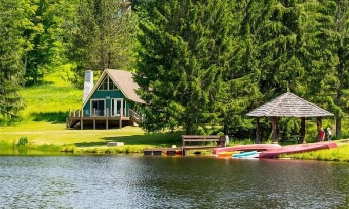 Davis House | Scenic Lake Front Chalet: Relax with Hot Tub & A/C
