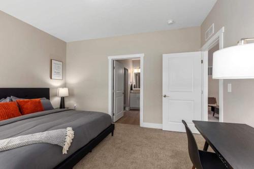 Grandville Apartment | Modern 16BR 16BA Condos w Garage and Patio