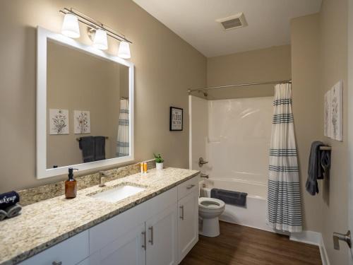 Grandville House | Guest Rated 10/10: Modern 2BR Condo with Garage & Patio